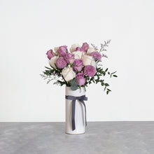 Mauve 花和花瓶